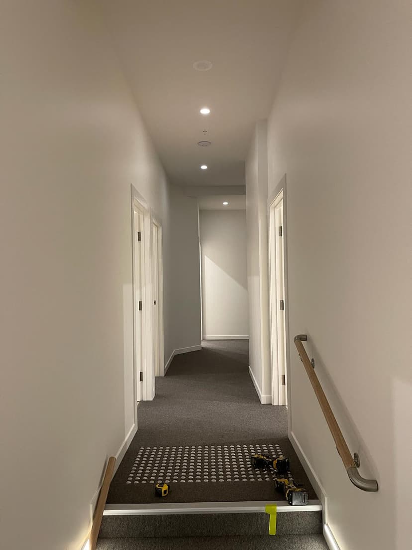 Freshly painted hallway with wooden flooring